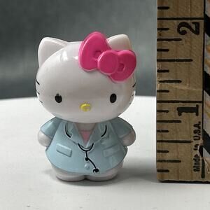 Hello Kitty Figure Doctor Outfit Spinmaster Surprise Toy Pink Bow Medical Theme